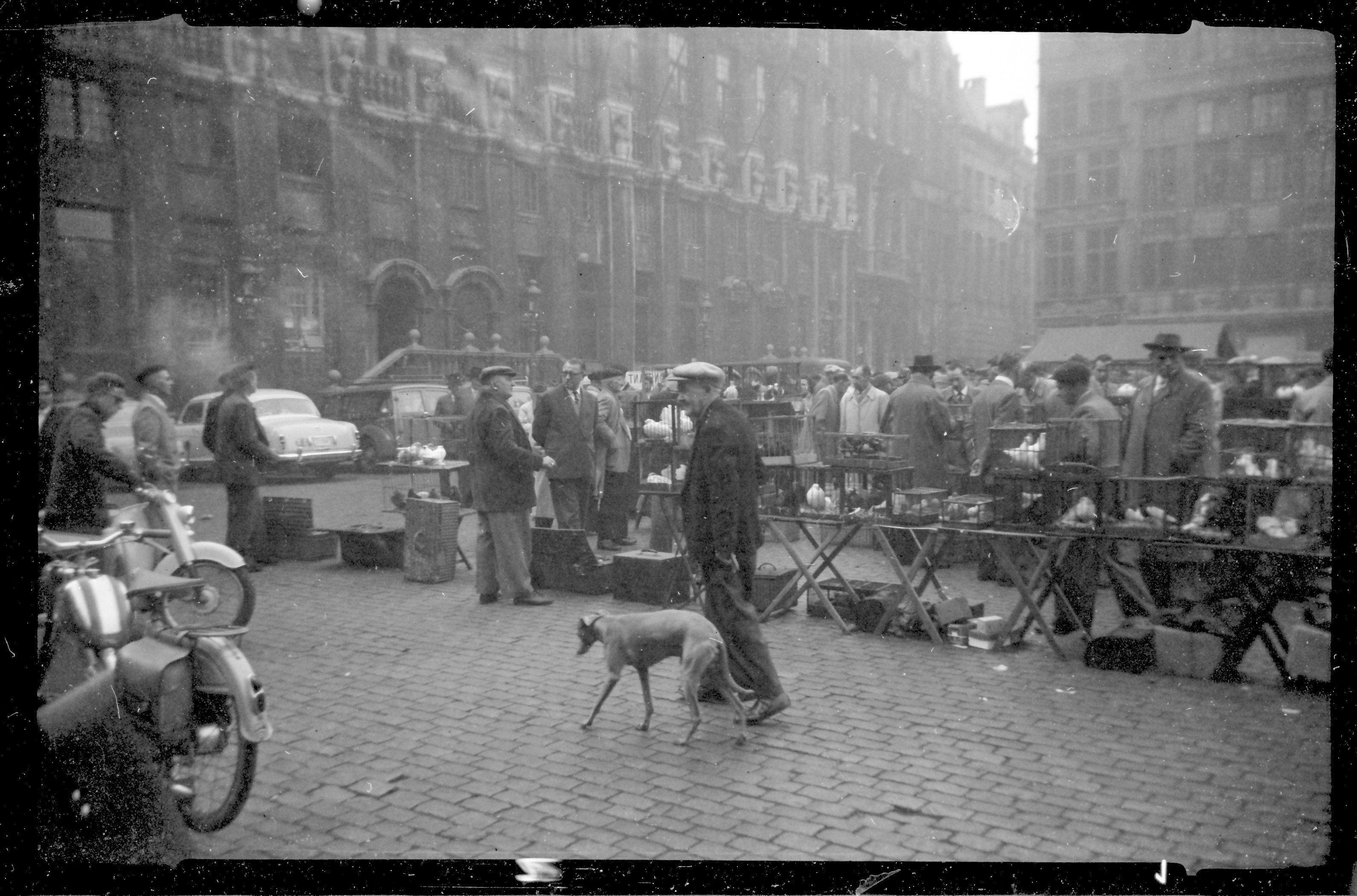 grayscale photo of people walking on street