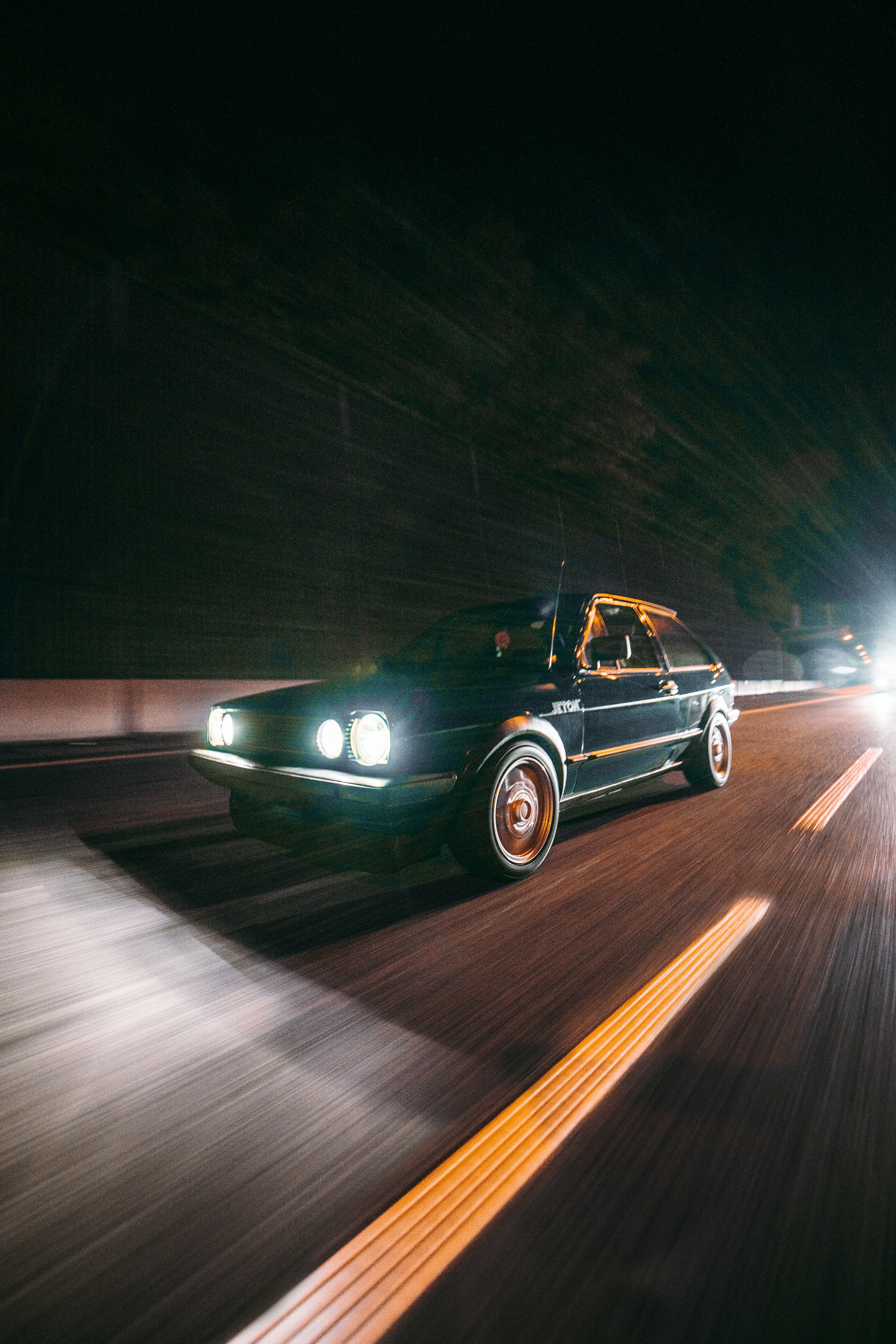 black mercedes benz coupe on road during night time