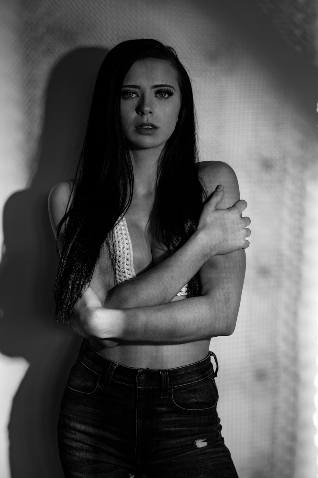 grayscale photo of woman in black denim shorts