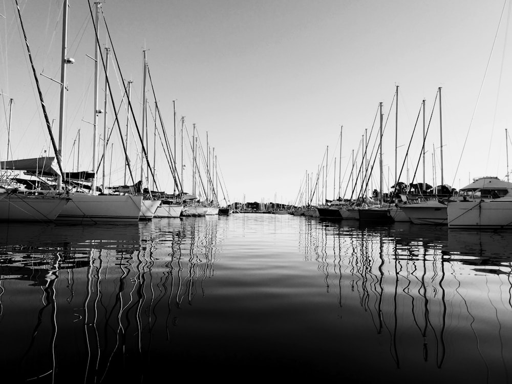 white boat on body of water during daytime