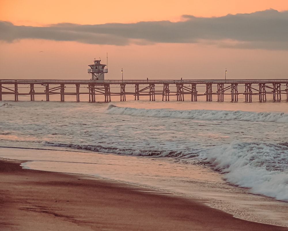 brown wooden dock on sea during daytime