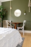 white and brown wooden chair beside brown wooden table