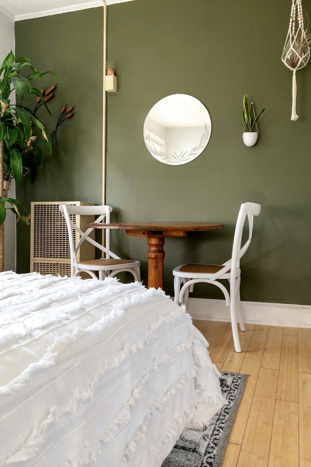 white and brown wooden chair beside brown wooden table