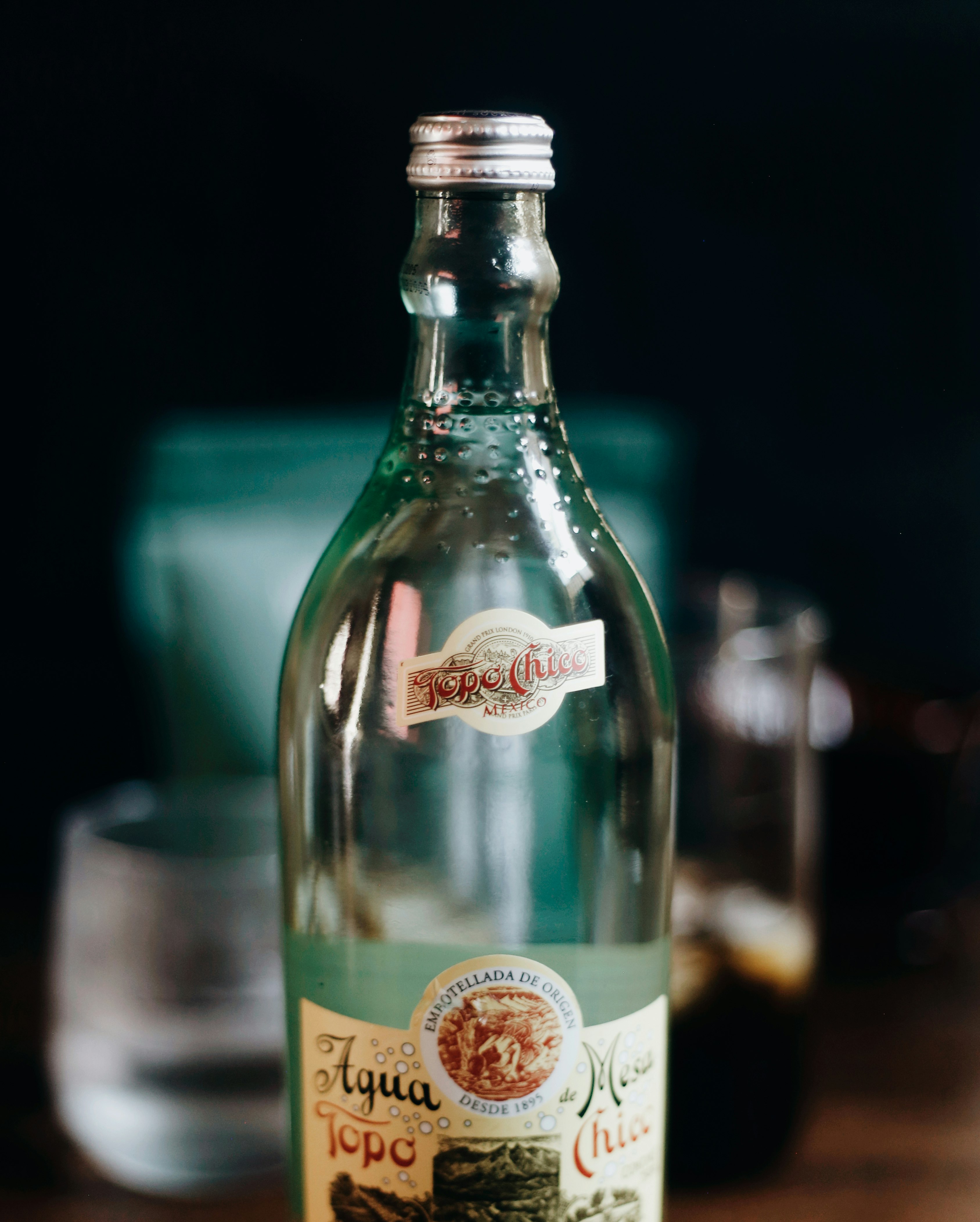 white labeled bottle on table