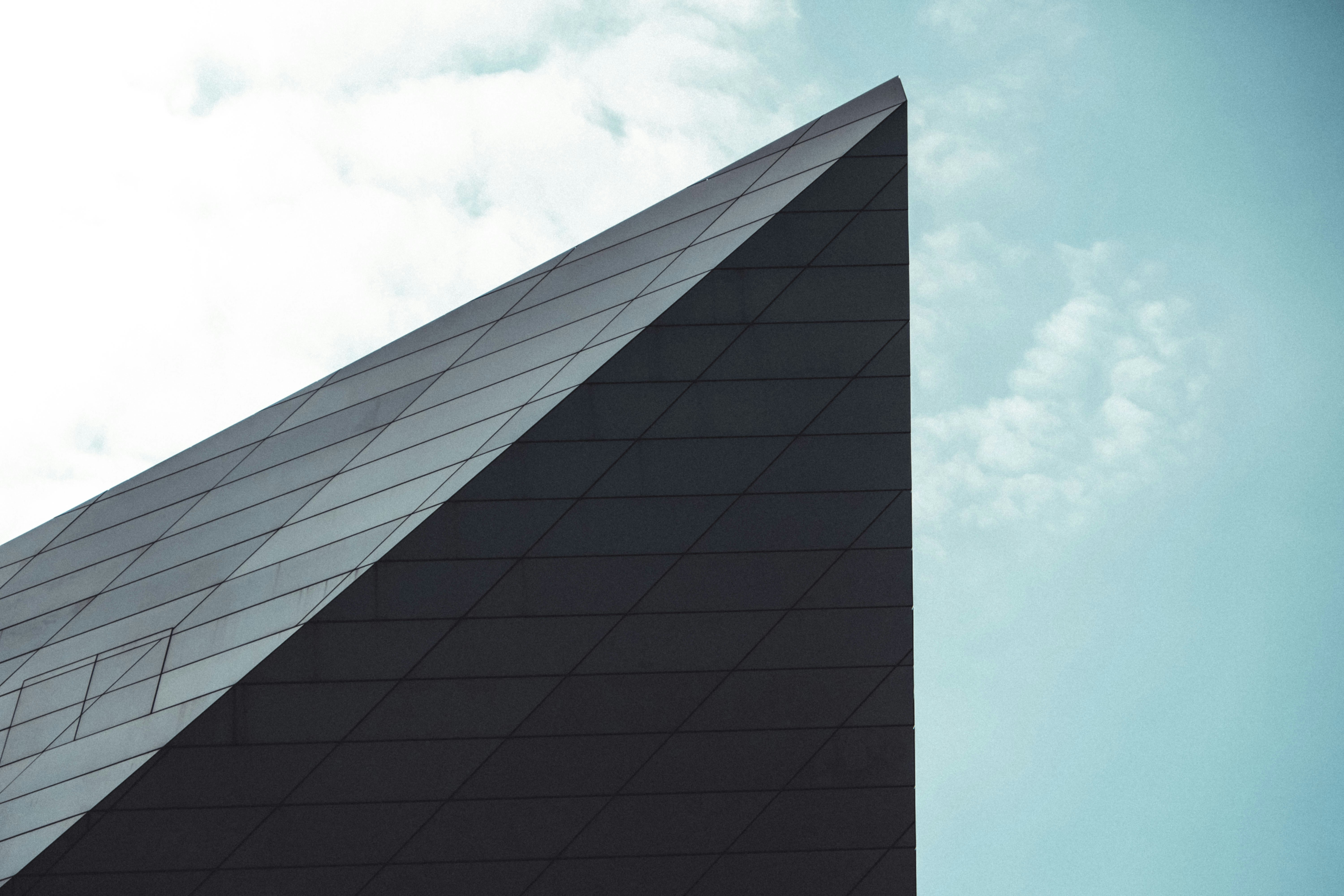 black concrete building under blue sky during daytime