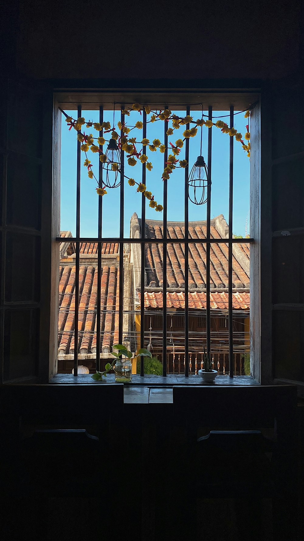 brown wooden window frame with brown leaves