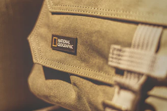A close-up of a sturdy jute bag with a custom logo printed on the front.