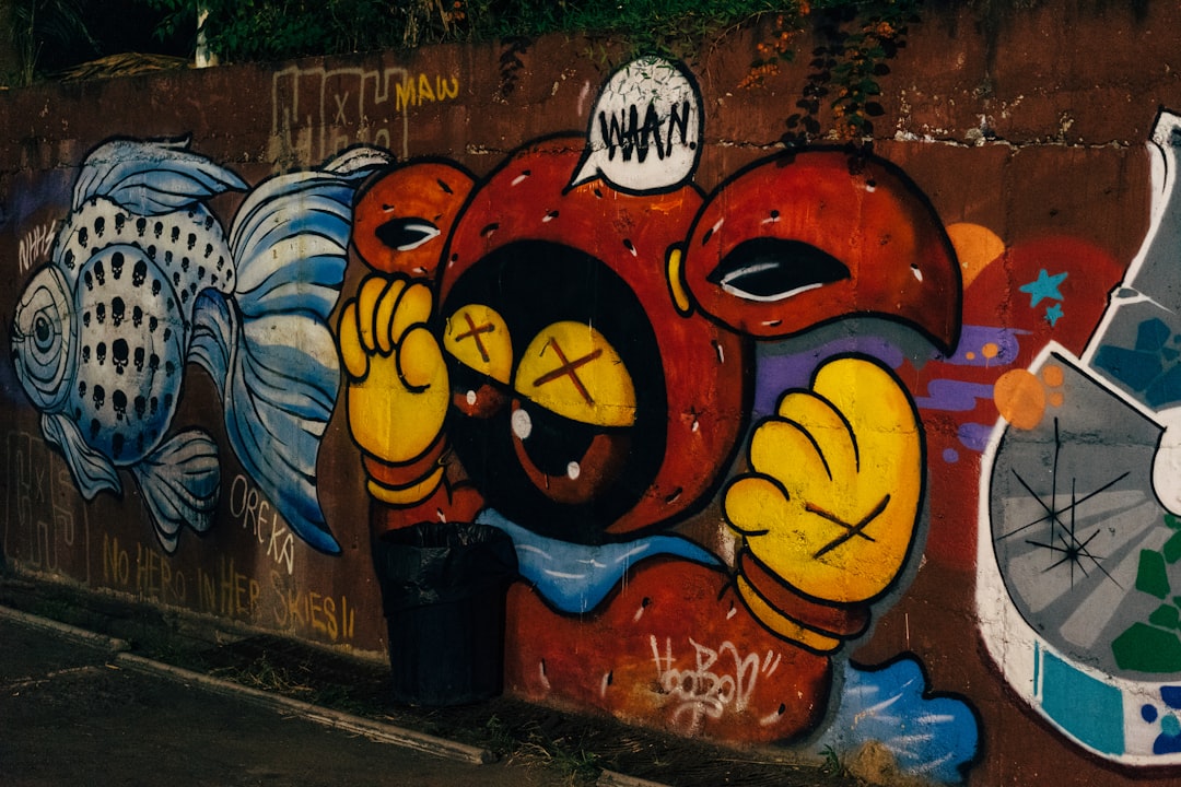 yellow and black cat graffiti,