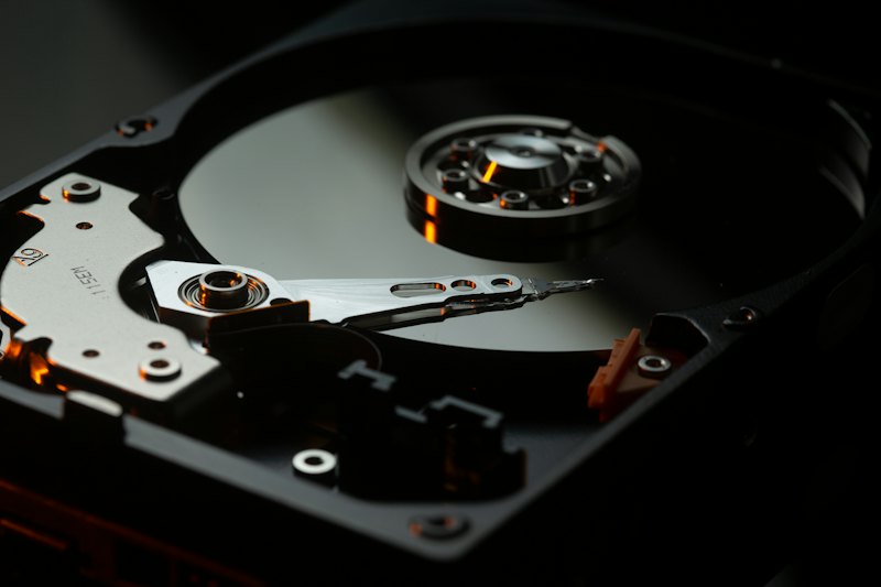 Open hard drive under dramatic lighting