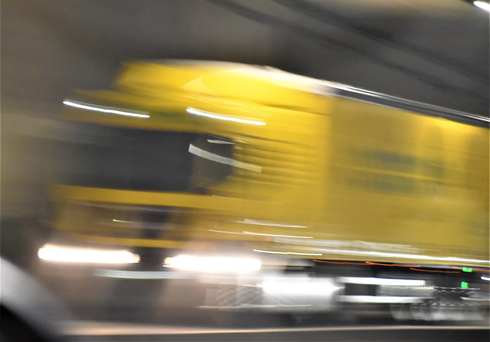 yellow car on the road