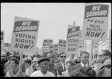 Youth holding signs demanding their rights.