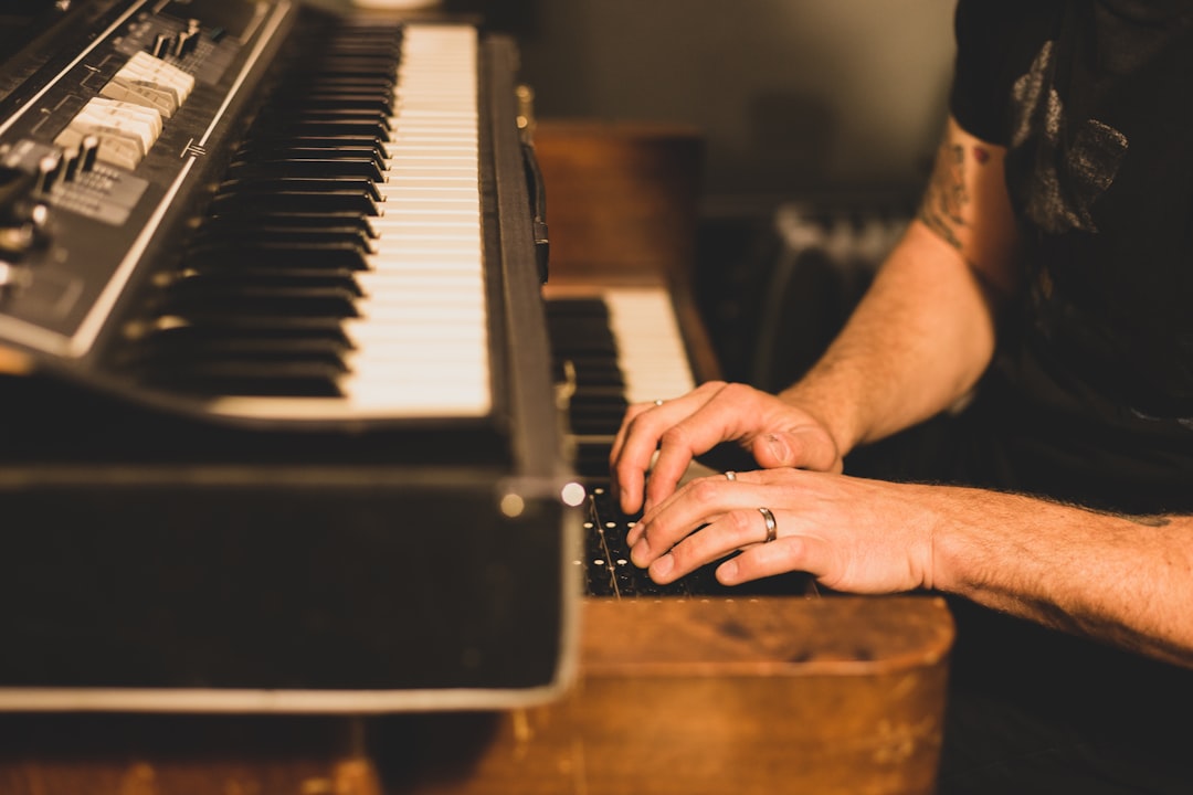 person playing piano on the stage