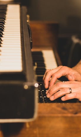 person playing piano on the stage