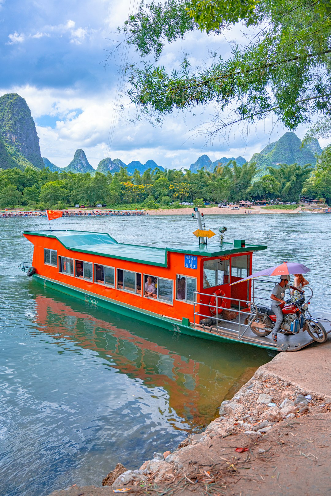 red and white boat on water during daytime