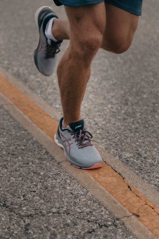 Close-up of track spikes on a starting line