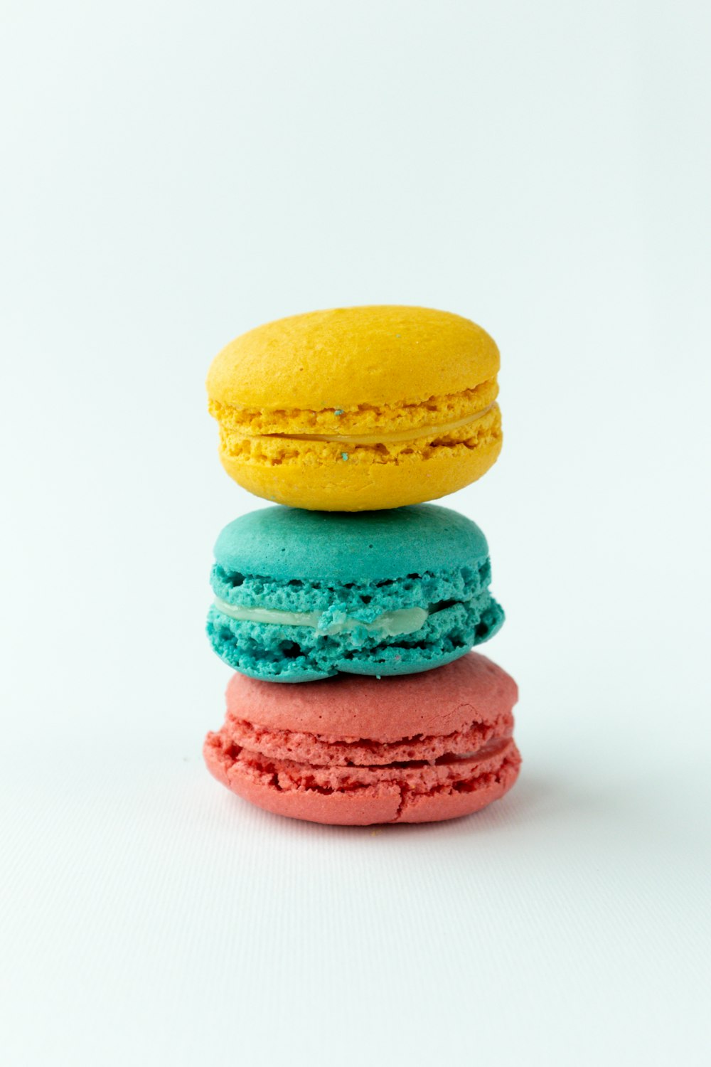 3 yellow and pink macaroons