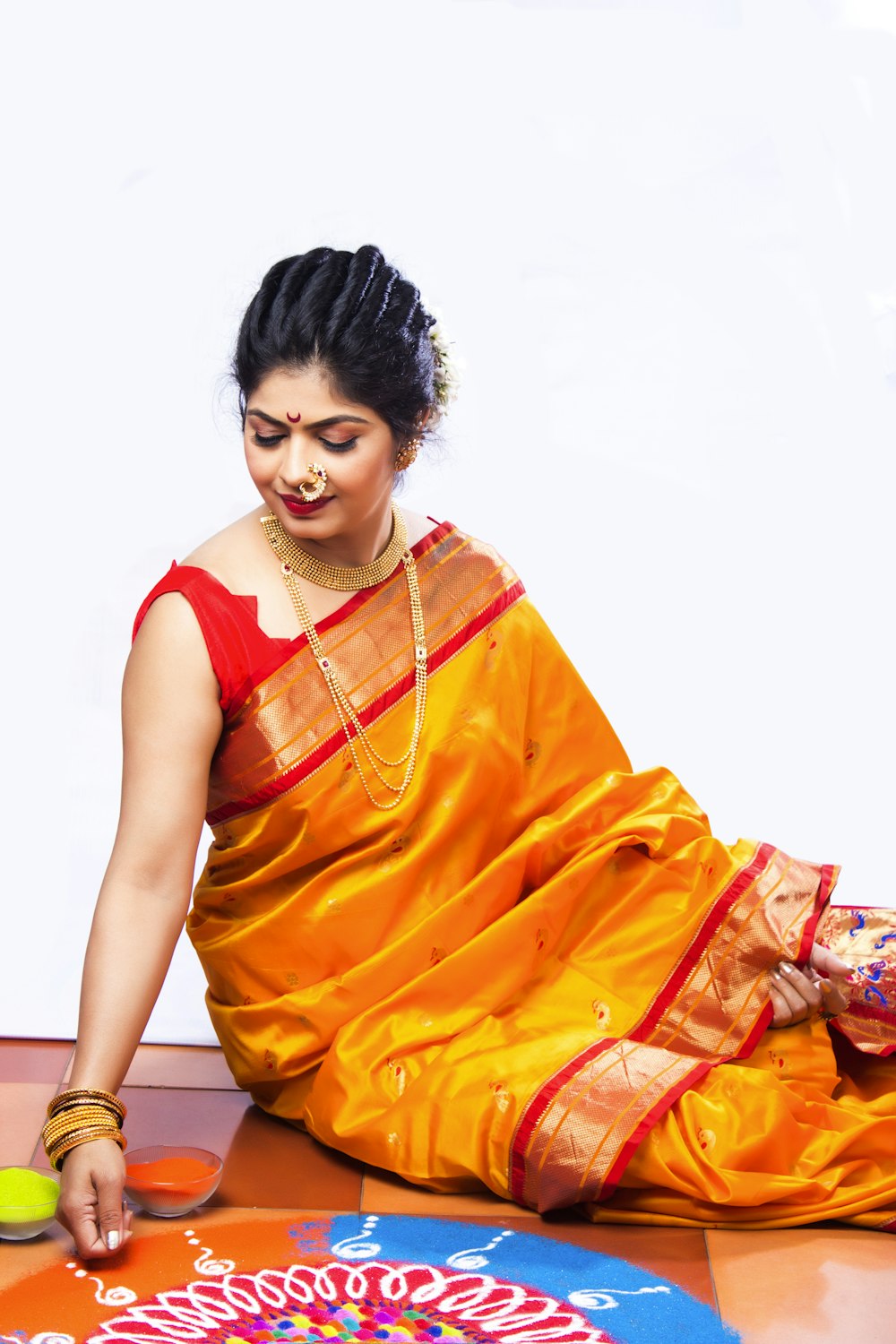 woman in orange sleeveless dress