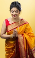 woman in yellow and red sari