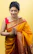 woman in yellow and red sari