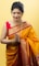 woman in yellow and red sari