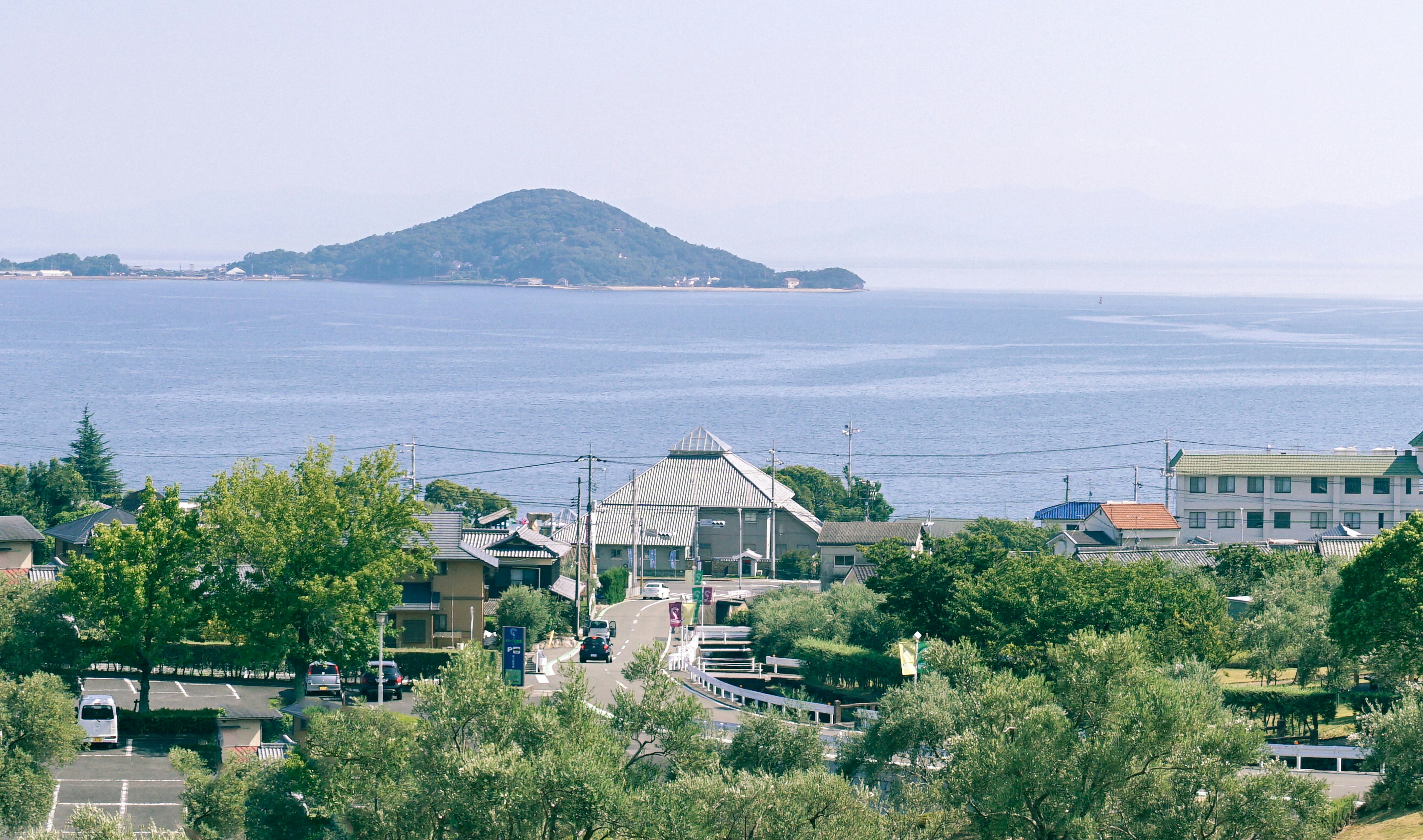 houses near body of water during daytime