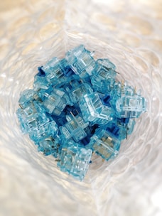 blue and white plastic toy blocks on water