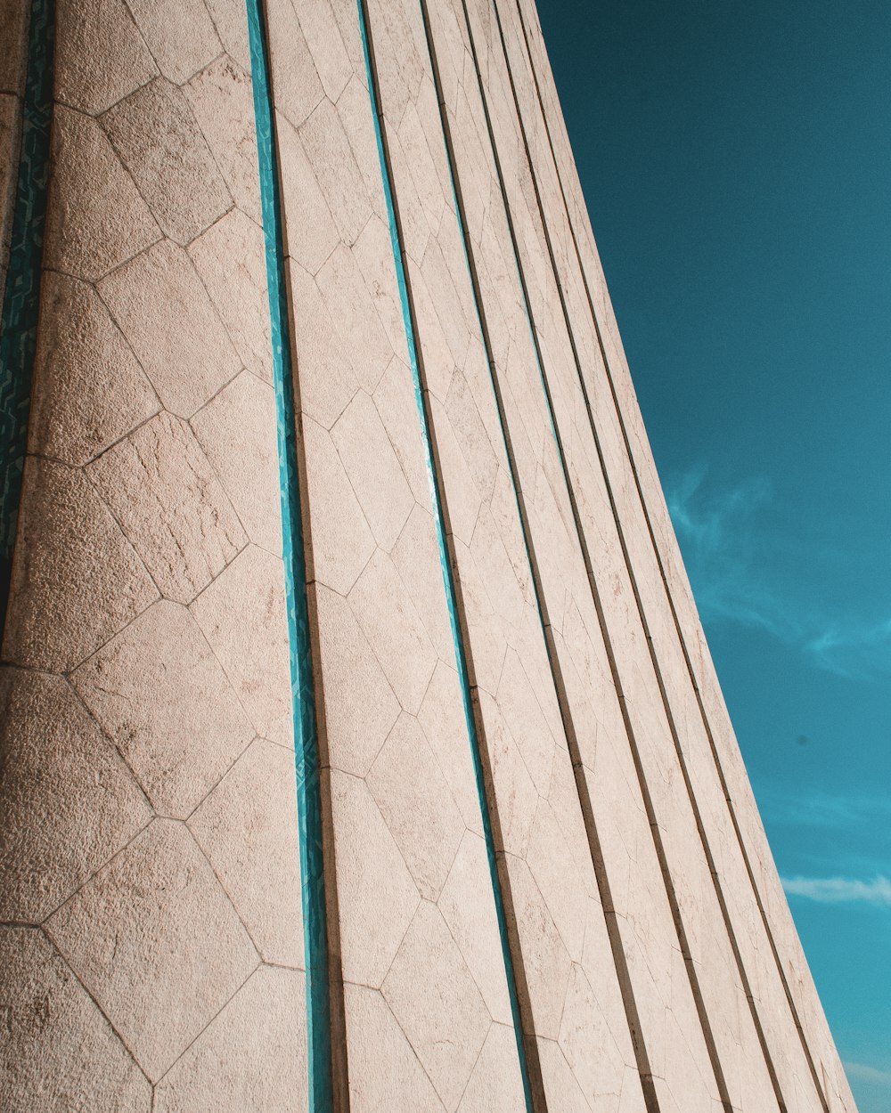 gray concrete building under blue sky during daytime