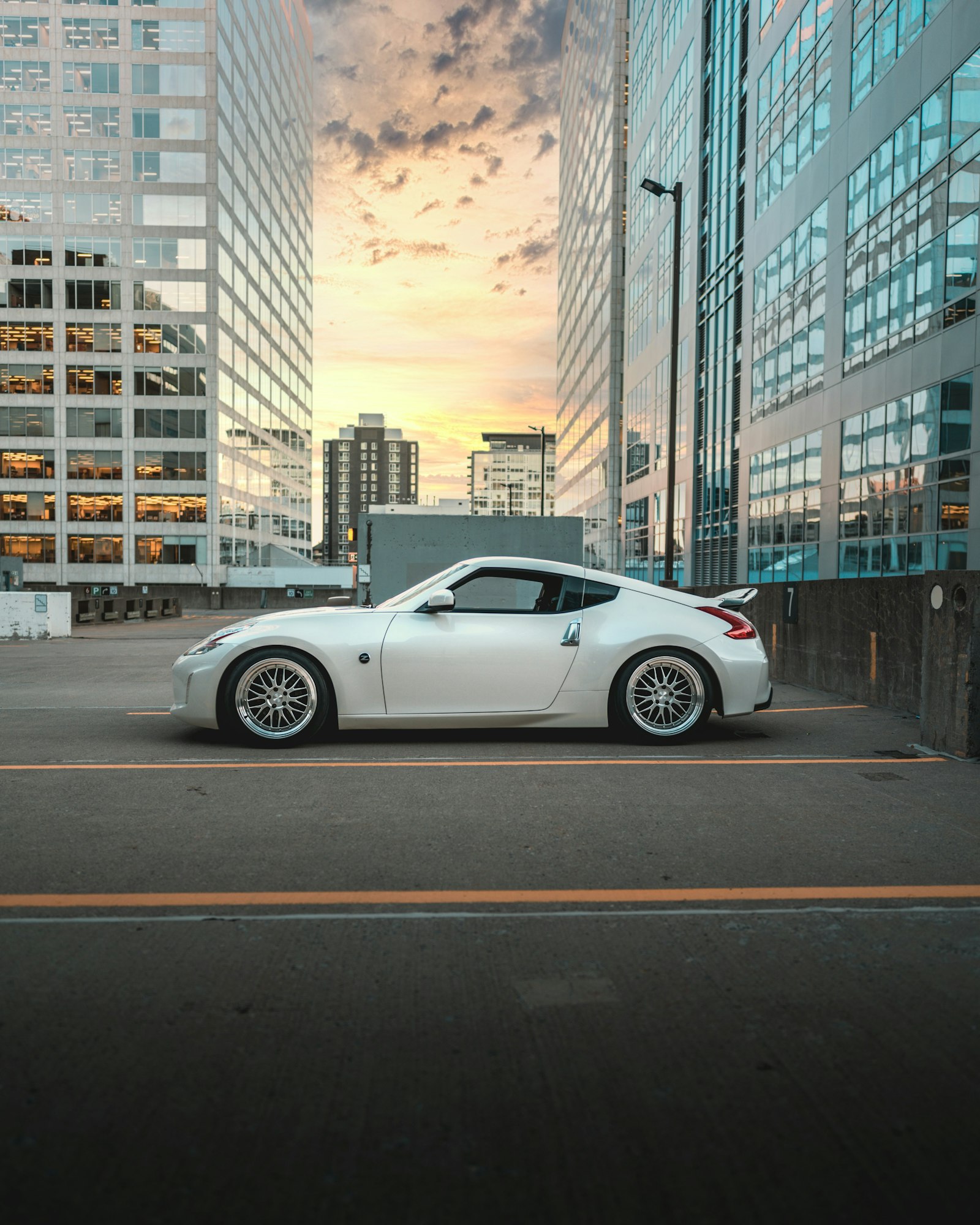 Sony a7R III + Sony FE 24mm F1.4 GM sample photo. White coupe on road photography