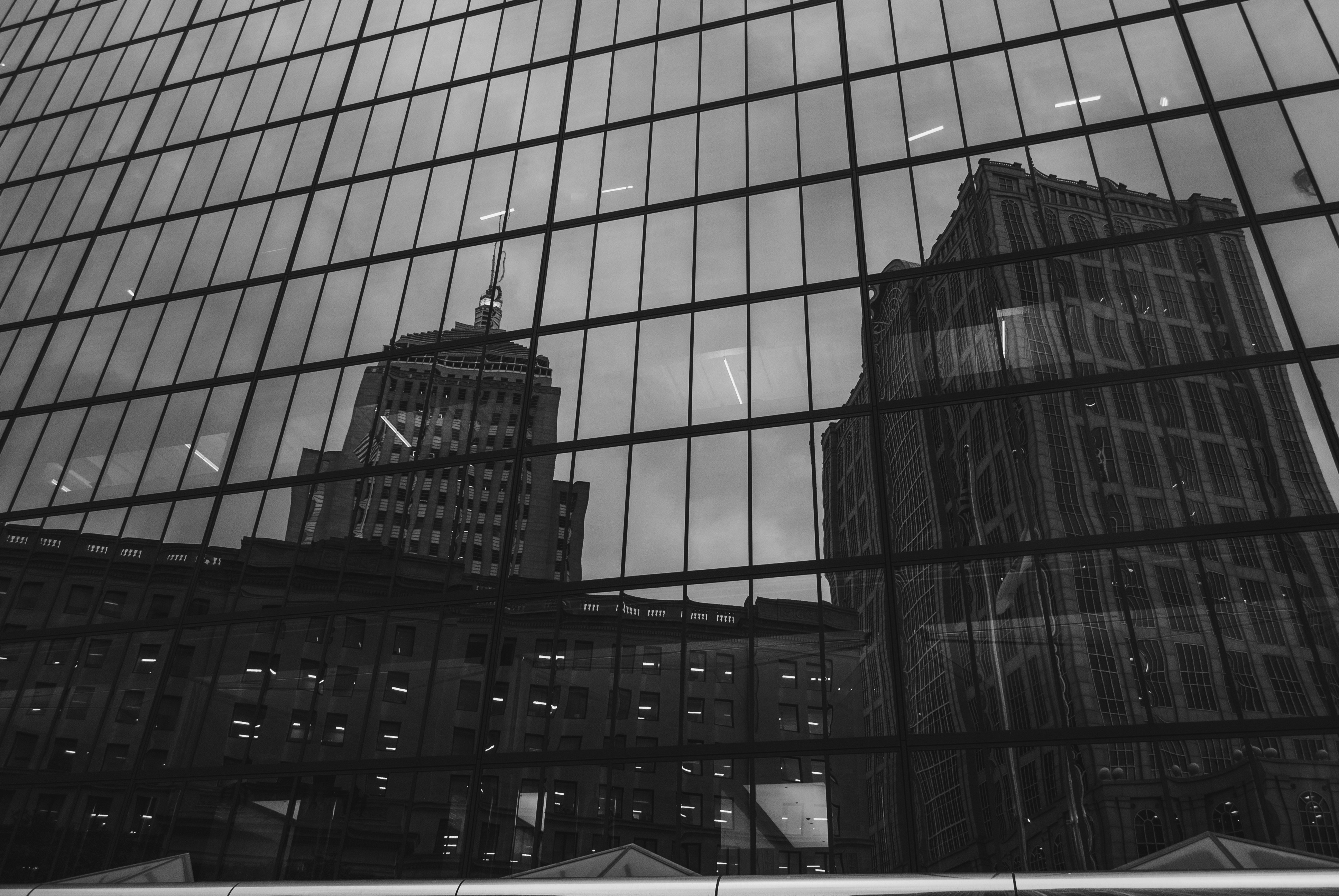 grayscale photo of high rise building