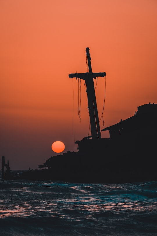 silhouette of ship on sea during sunset in Kish Iran