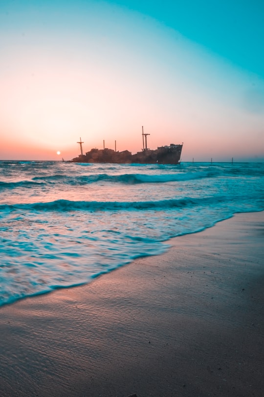 brown ship on sea during daytime in Kish Iran