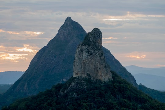 gray rocky mountain under white cloudy sky during daytime in Mount Beerwah Australia