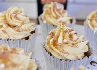 white cupcake on white table