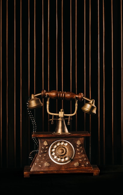 black and gold rotary phone