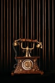 black and gold rotary phone