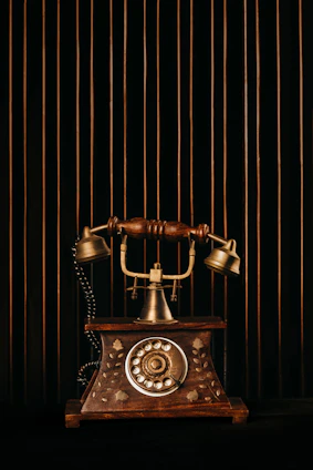 black and gold rotary phone