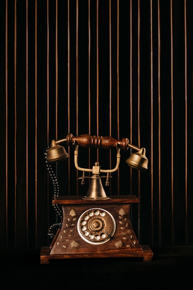 black and gold rotary phone