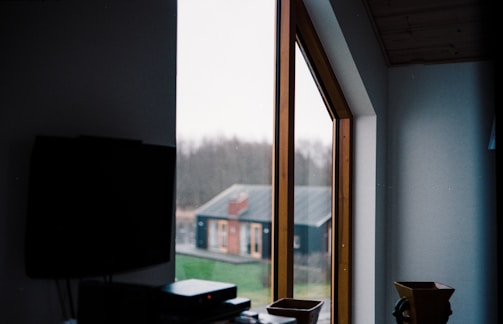 A panoramic view of various window treatments installed in a modern living space.