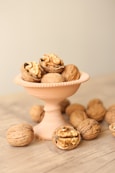 white ceramic bowl with brown and white mushrooms
