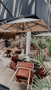 An elegant outdoor dining area with modern furniture.