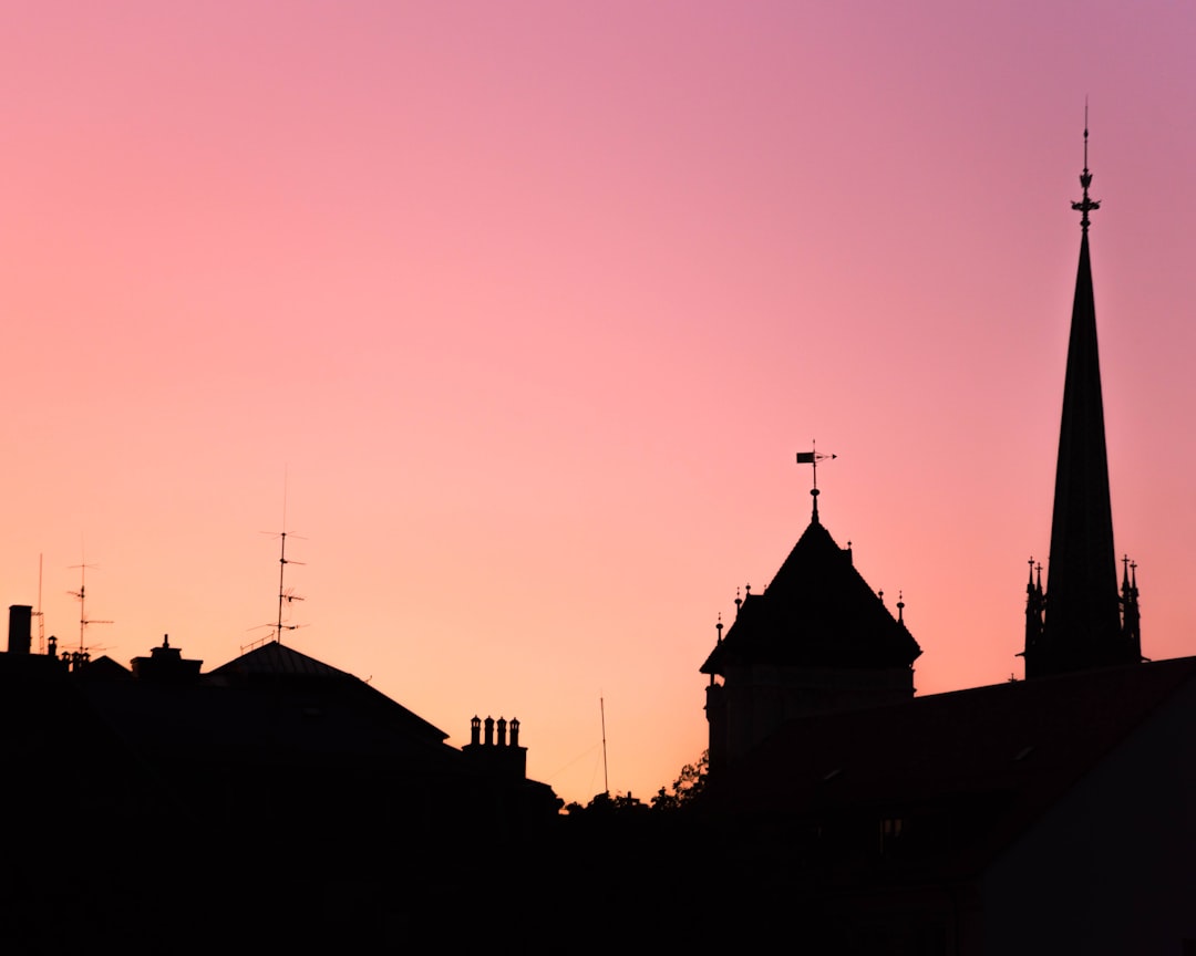 silhouette of church during sunset