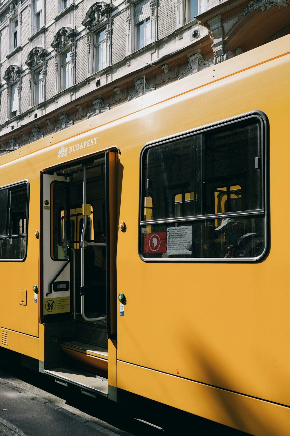 yellow and white train during daytime