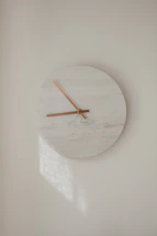 white round analog wall clock