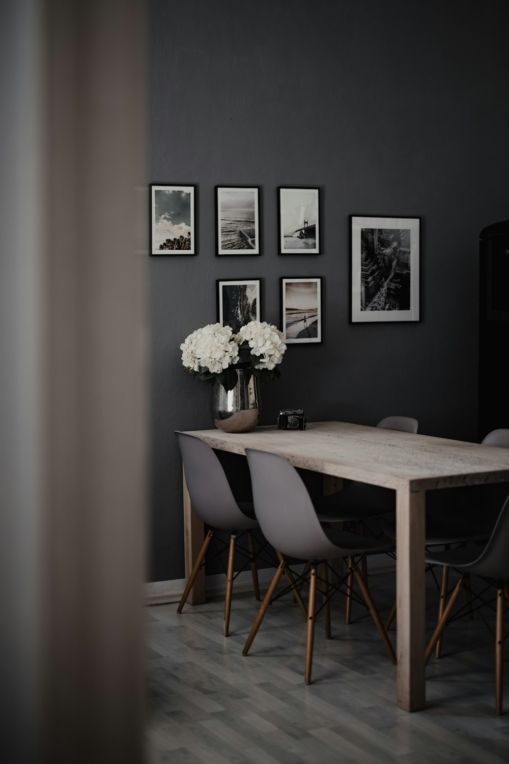 white flower in vase on table