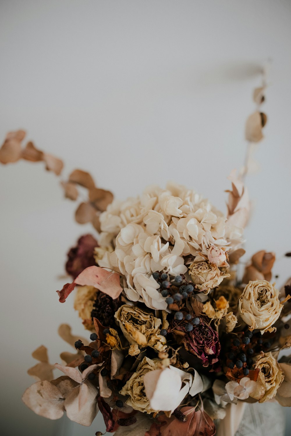 white flower on white table