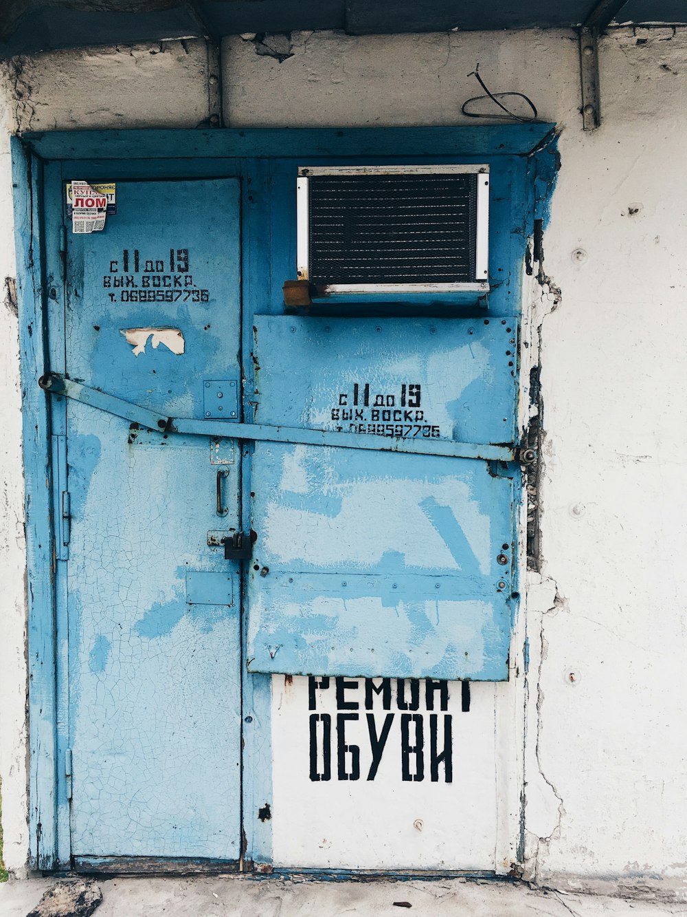 blue and white wooden door