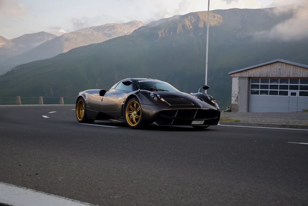 black porsche 911 on road during daytime