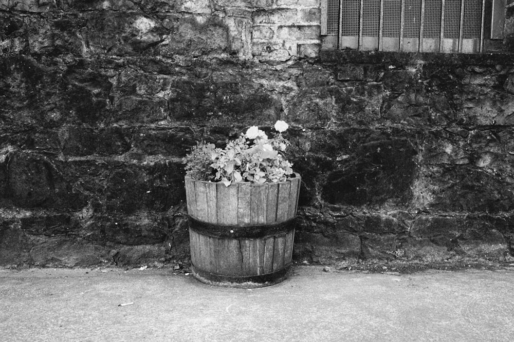 gray scale photo of garbage bin