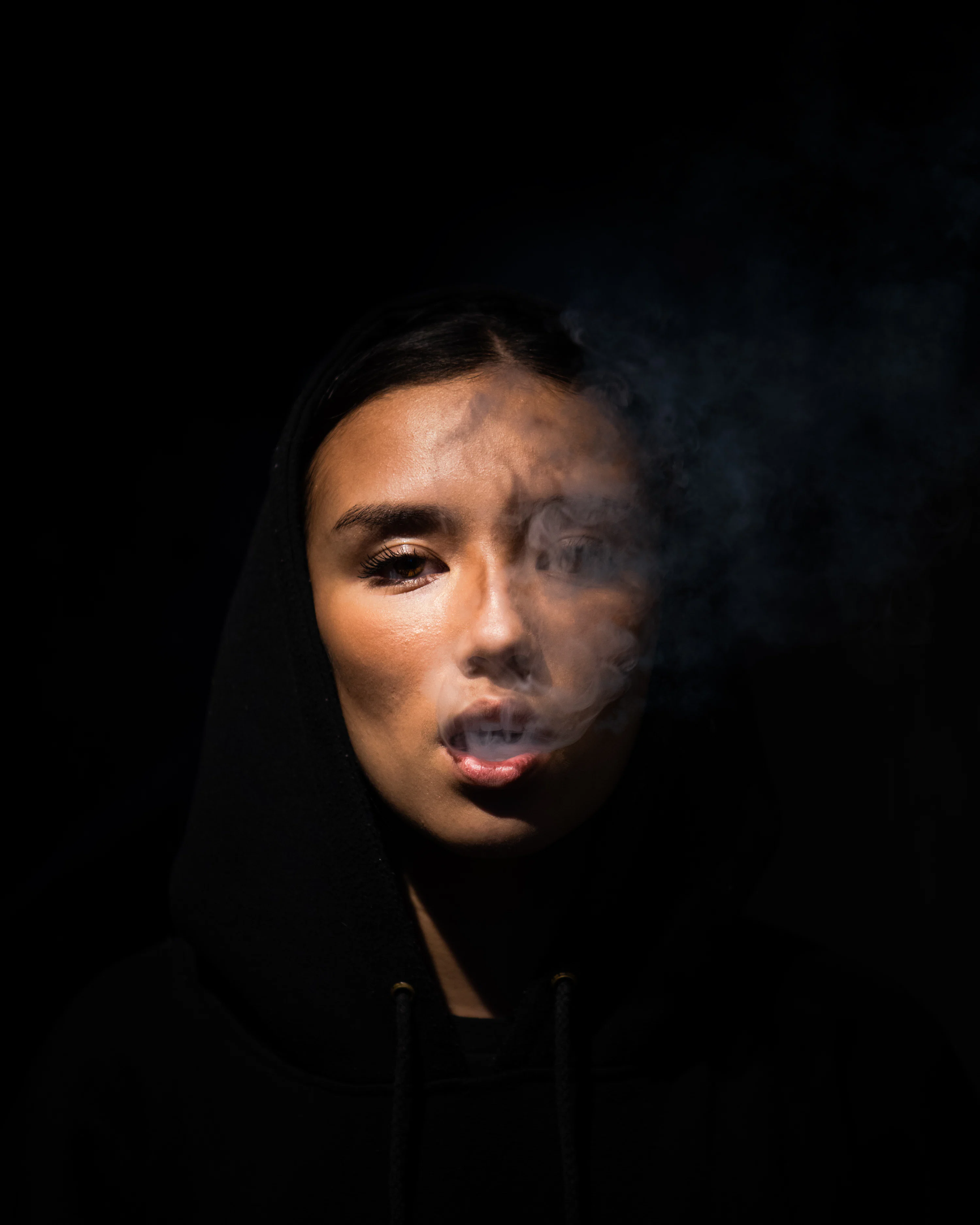cigarette selfie Brand new smoking from @Jonesy0015 who reminds us in times of crisis, you can just smoke a Woman in black hoodie taking