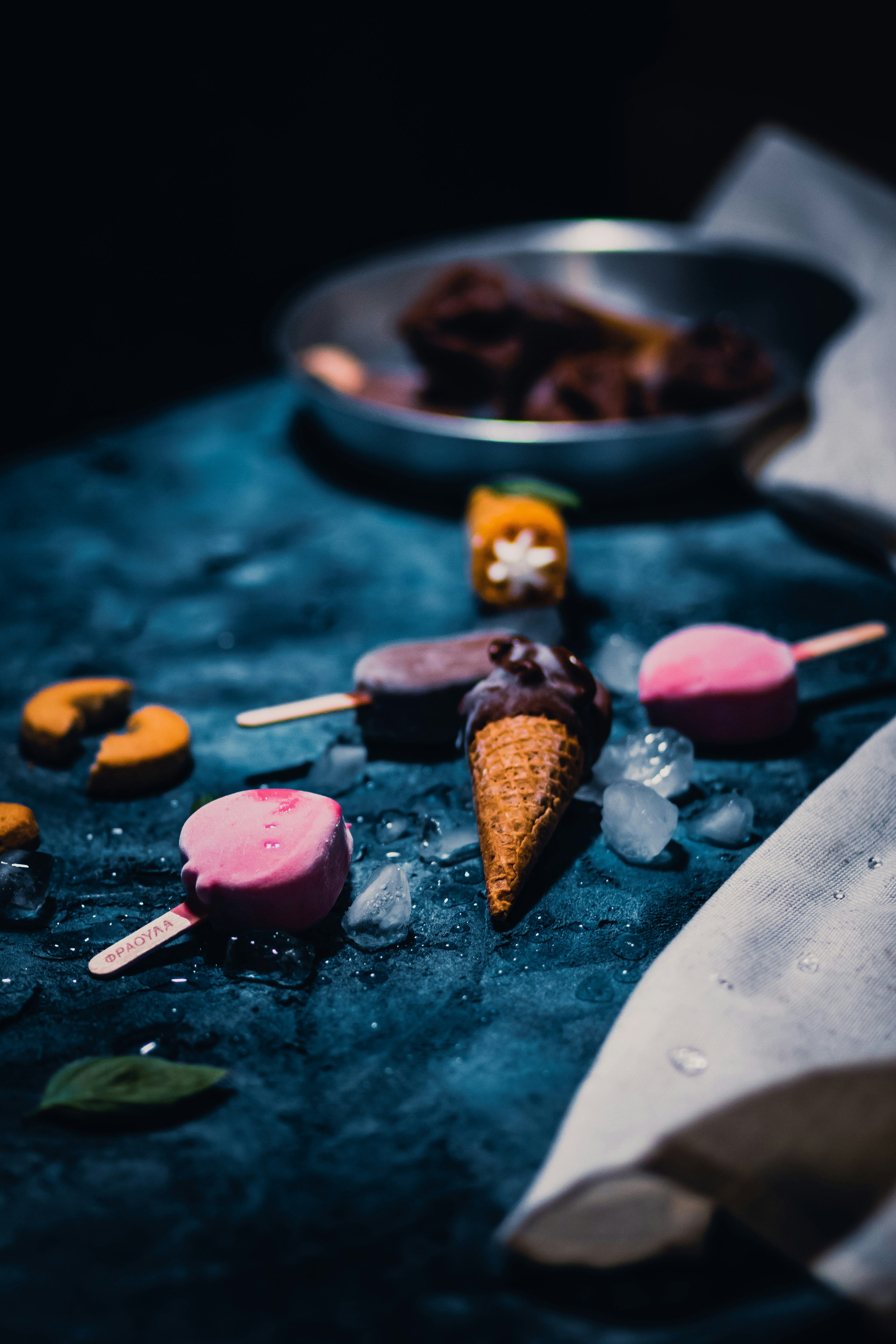 pink and yellow ice cream on blue ceramic plate